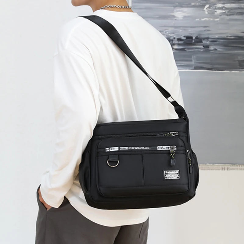 Men's business single-shoulder bag, suitable for business trips and work, made of nylon material, with a single shoulder strap.