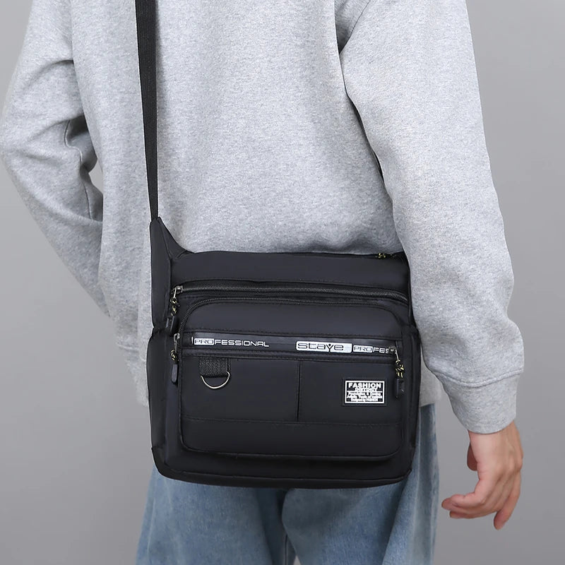 Men's business single-shoulder bag, suitable for business trips and work, made of nylon material, with a single shoulder strap.