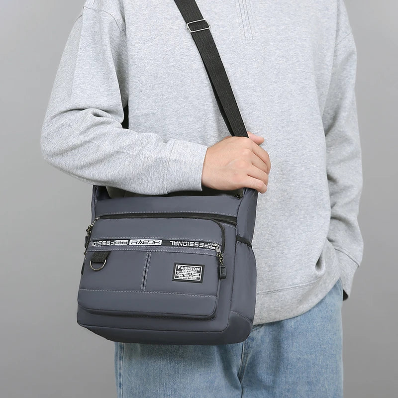 Men's business single-shoulder bag, suitable for business trips and work, made of nylon material, with a single shoulder strap.